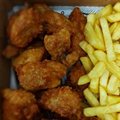 1KG CORTE COXA SOBRE COXA SEM OSSO EMPANADA  300G COM POLENTA 300G BATATA FRITA
