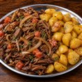 COSTELA BOVINA COM BATATA SOUTÉ